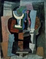 Compotier y botella sobre una mesa 1920 Pablo Picasso